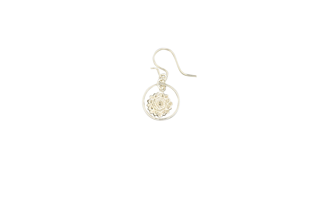 Silver flower earring on white background